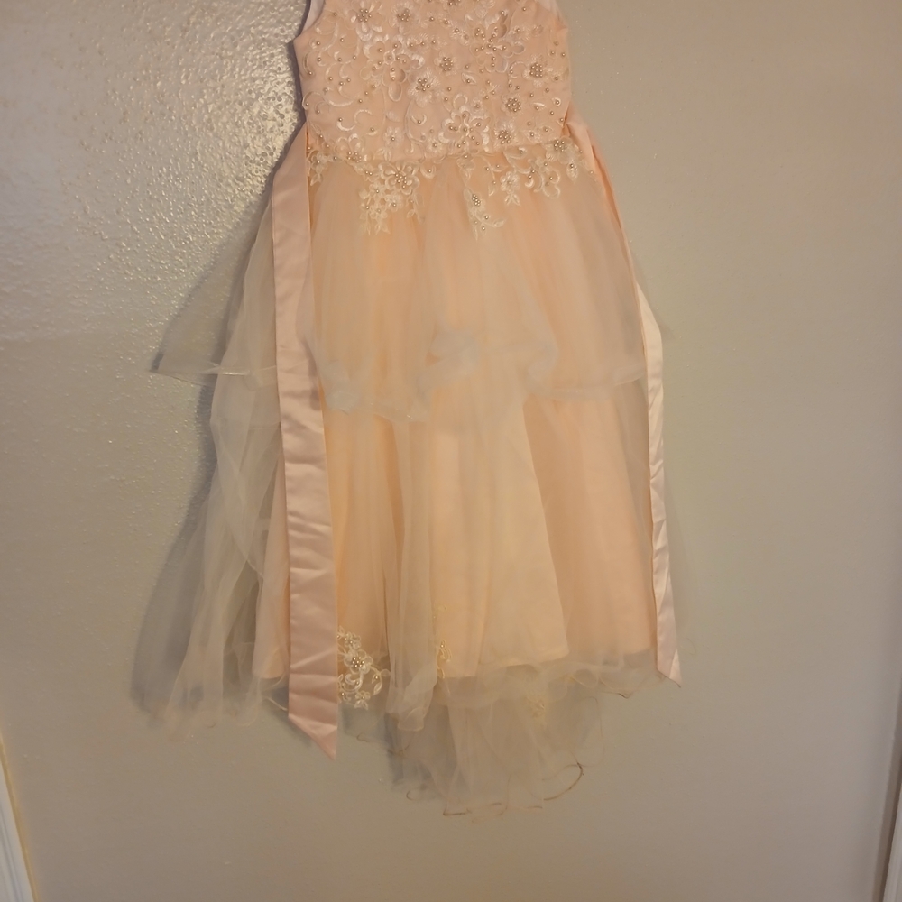 Charming Peach Kids Dress with Floral Details